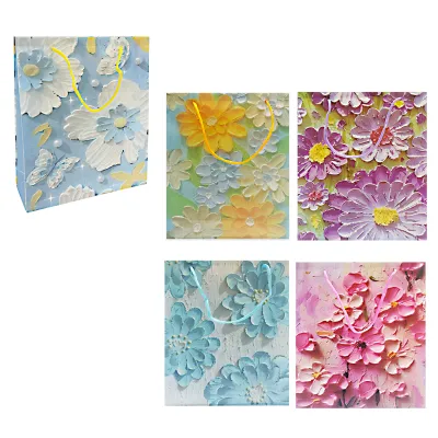 BOLSA REGALO PLASTICA FLORES 26.5*34*8CM (PQTX12)