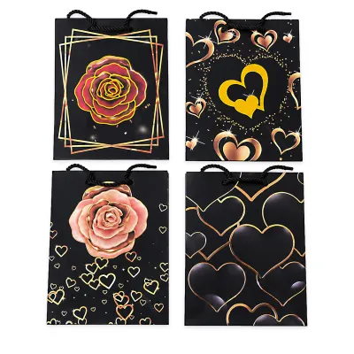BOLSA REGALO MOTIVOS NEGRA 32*26*10CM (PQTX12)