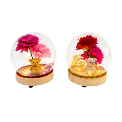 FLORES ARTIFICIALES CON OSO Y LUZ EN ESFERA CRISTAL