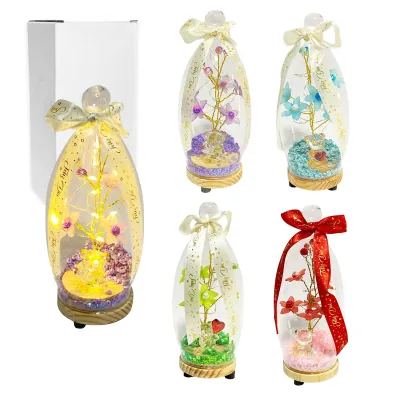 FLORES BRILLANTES CON OSO Y LUZ ENCAPSULADAS EN CRISTAL