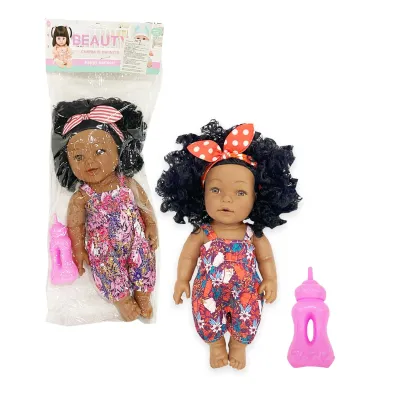 MUÑECA BEBE CON TETERO EN BOLSA (AG13)